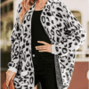 Temperament-commuting long sleeve loose large size leopard print cardigan sweater in Cardigans