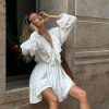 V Neck Pleating Bell Sleeve Ruffled White Dress in Dresses