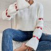 Loose Heart Jacquard Round Neck Flared Sleeves Sweater in Sweaters