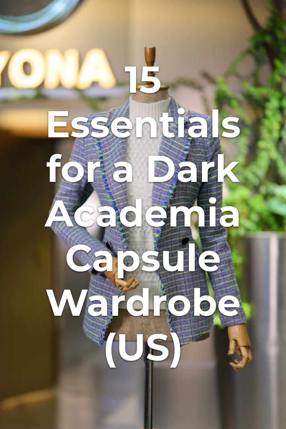 dark academia capsule wardrobe look with plaid blazer and white knit sweater on mannequin