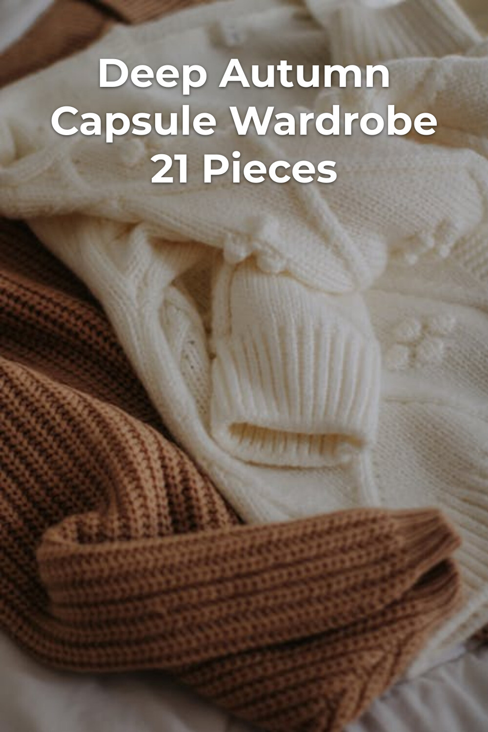 Deep Autumn Capsule Wardrobe Knit Essentials Deep autumn capsule wardrobe essentials: white knitted sweater with brown scarf on a bed