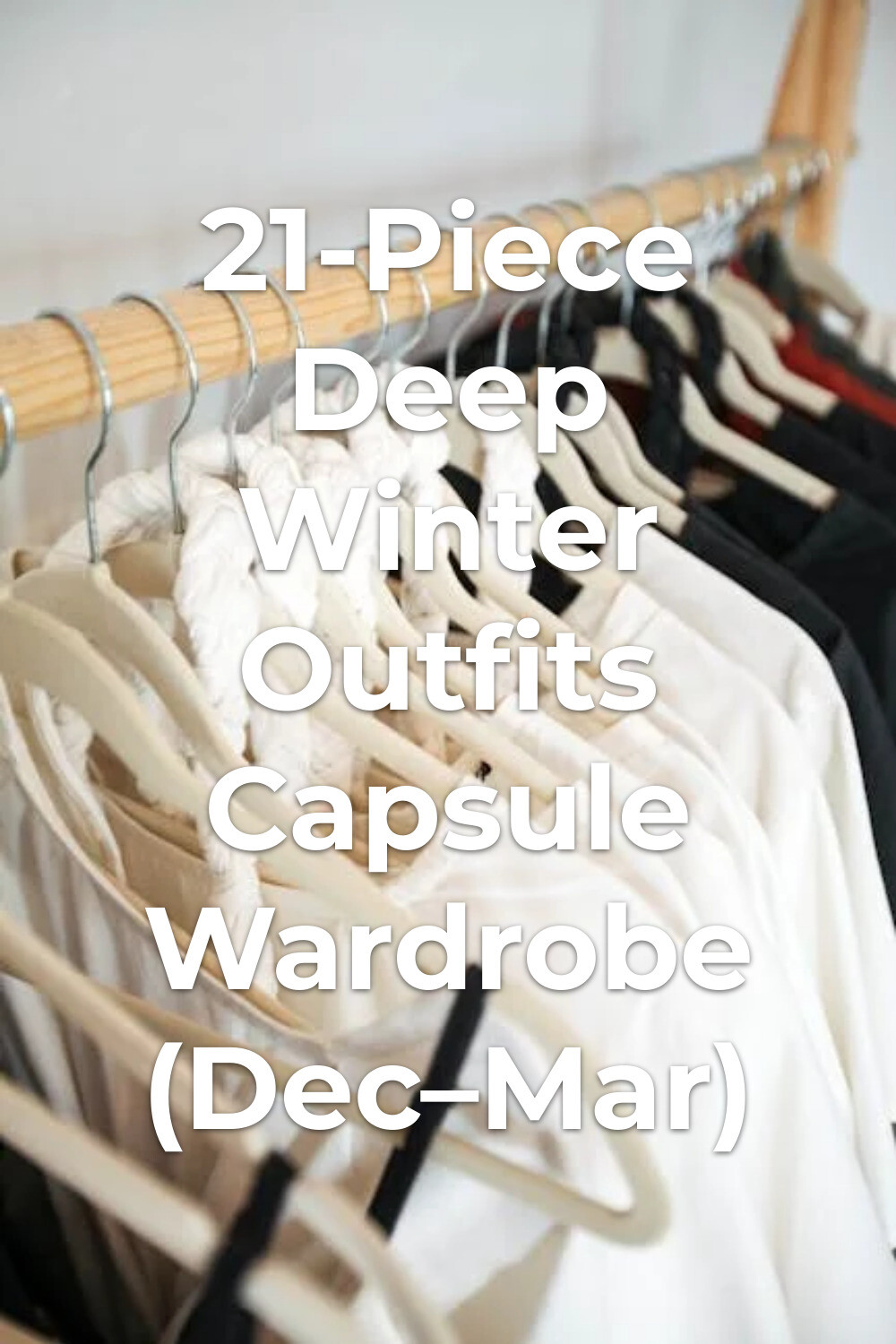 deep winter outfits capsule wardrobe with black and white minimalist tops on hangers