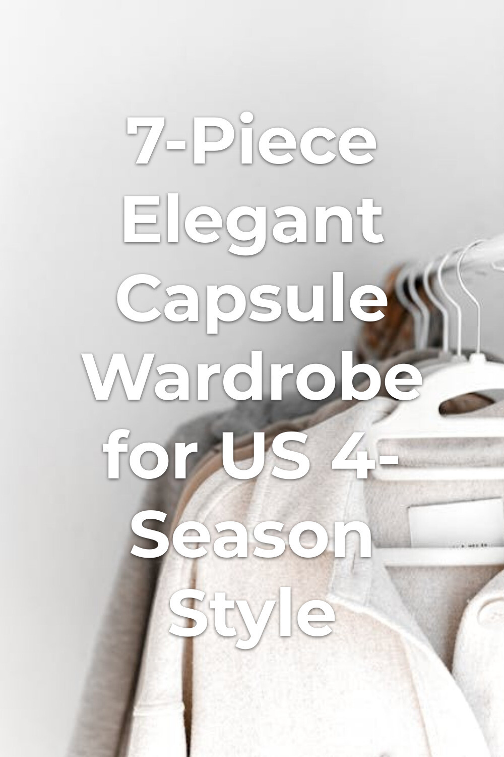 Elegant Capsule Wardrobe Sweaters on Hangers Elegant capsule wardrobe sweaters on white hangers against a plain wall