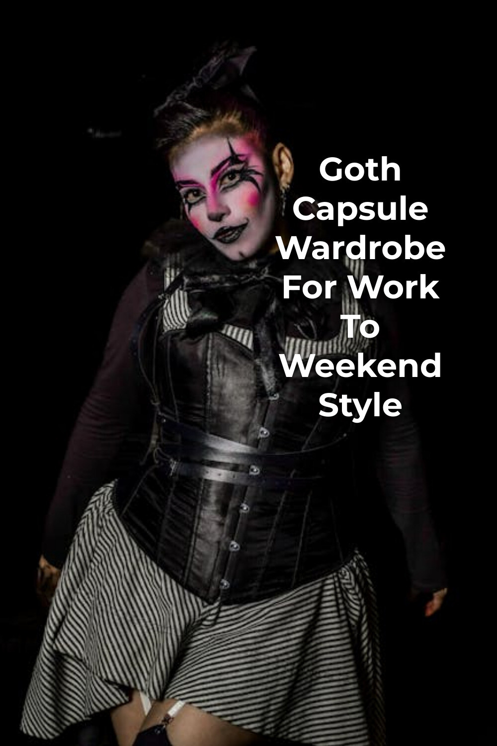 Goth capsule wardrobe corset and striped dress Goth capsule wardrobe look with black corset over striped dress and pink-black makeup on a dark background
