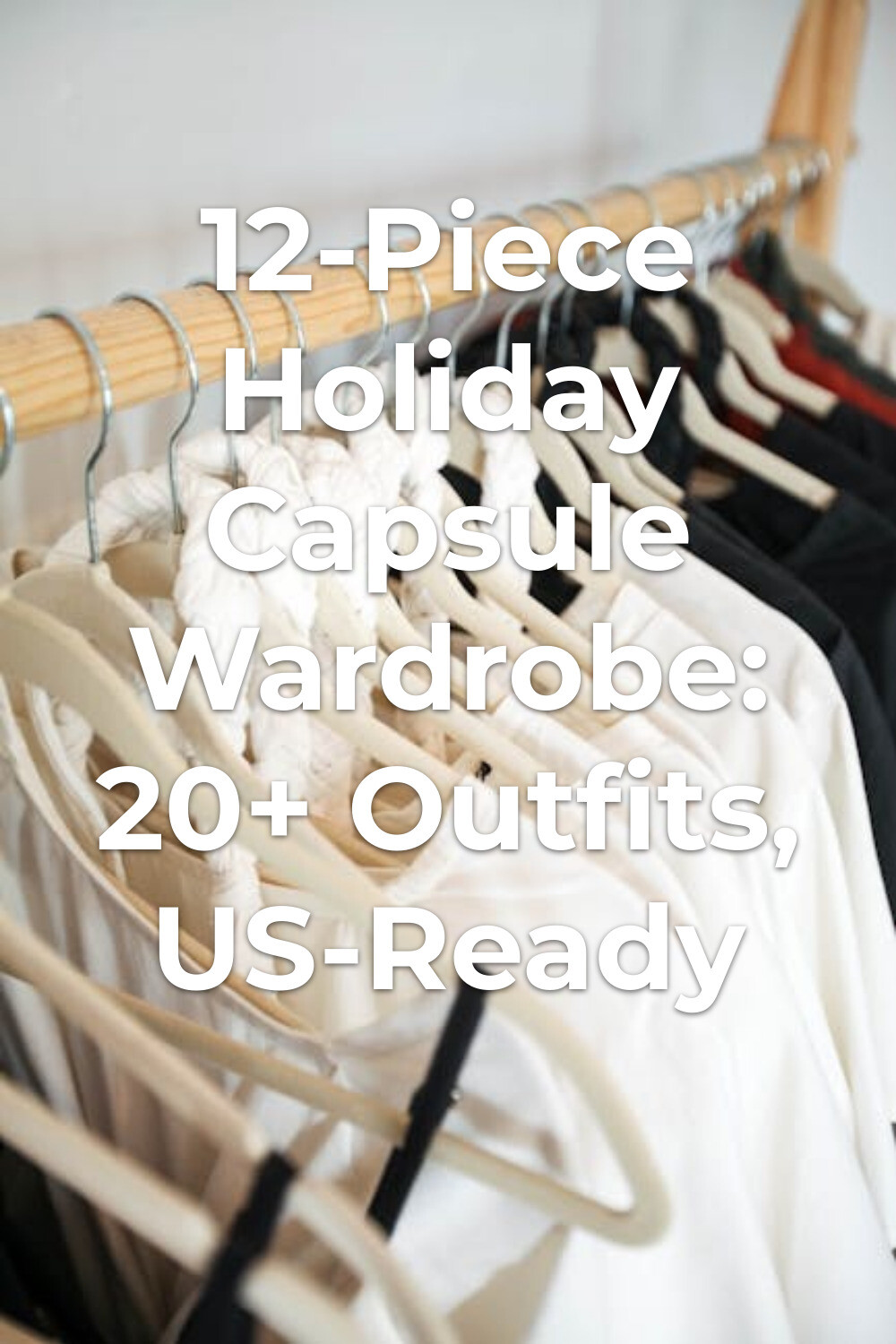 Holiday capsule wardrobe on wooden rack Holiday capsule wardrobe on a wooden rack with white and dark clothes hanging indoors