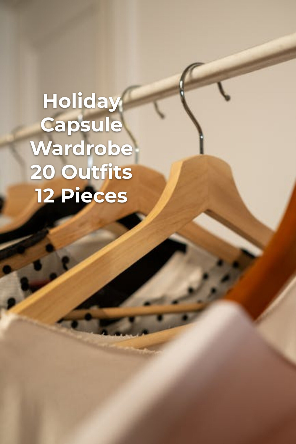 Holiday Capsule Wardrobe on Wooden Hangers Holiday capsule wardrobe on wooden hangers in a streamlined festive closet