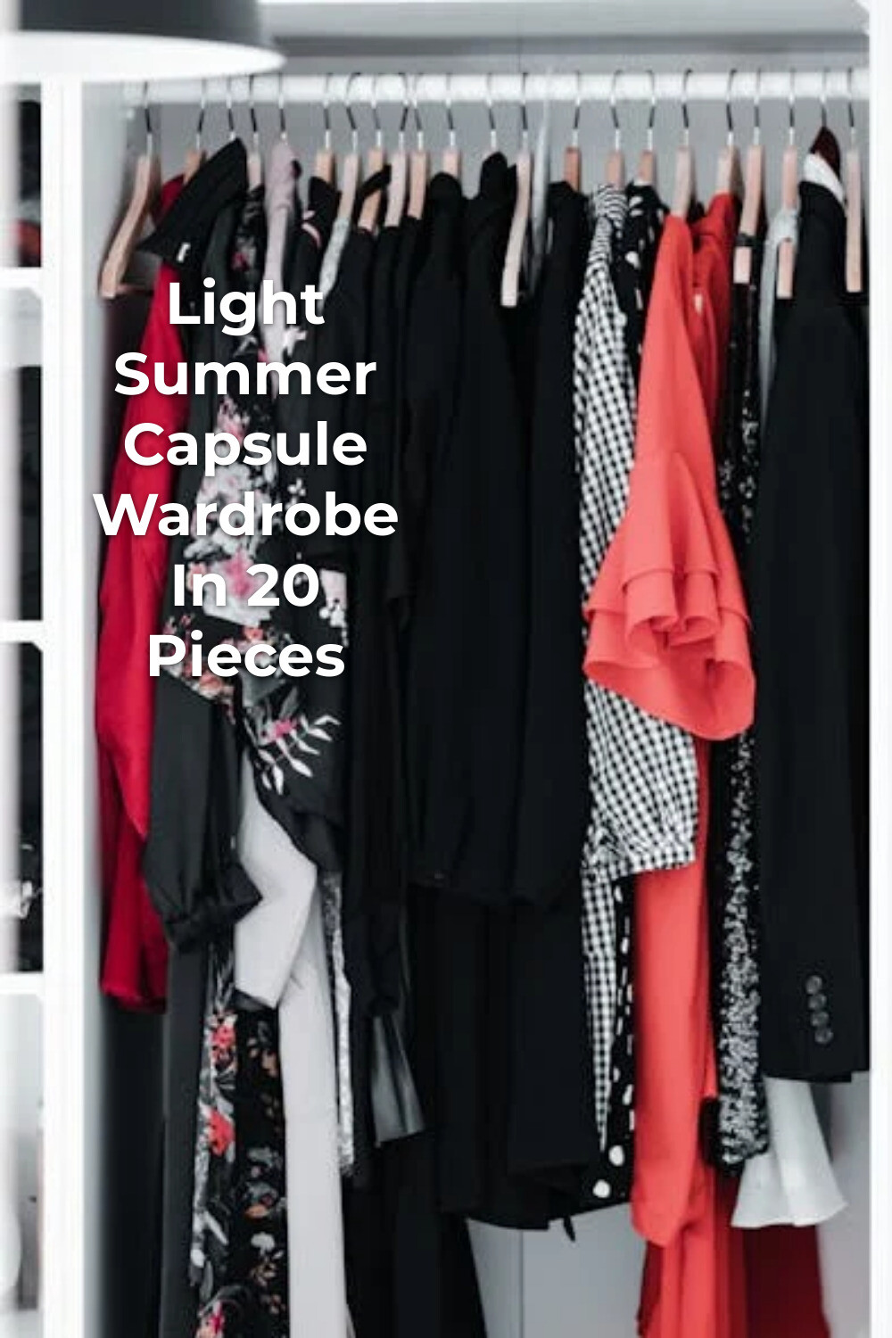 Light summer capsule wardrobe rail with assorted dresses and jackets in black, red, white and patterned fabrics