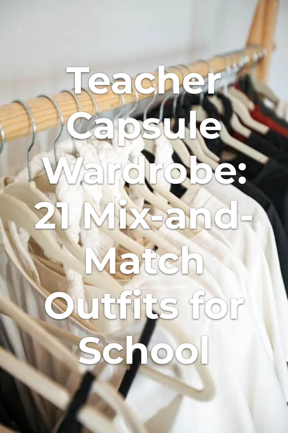 Teacher Capsule Wardrobe Clothing Rack Teacher capsule wardrobe with white and dark clothes on hangers on a wooden rack