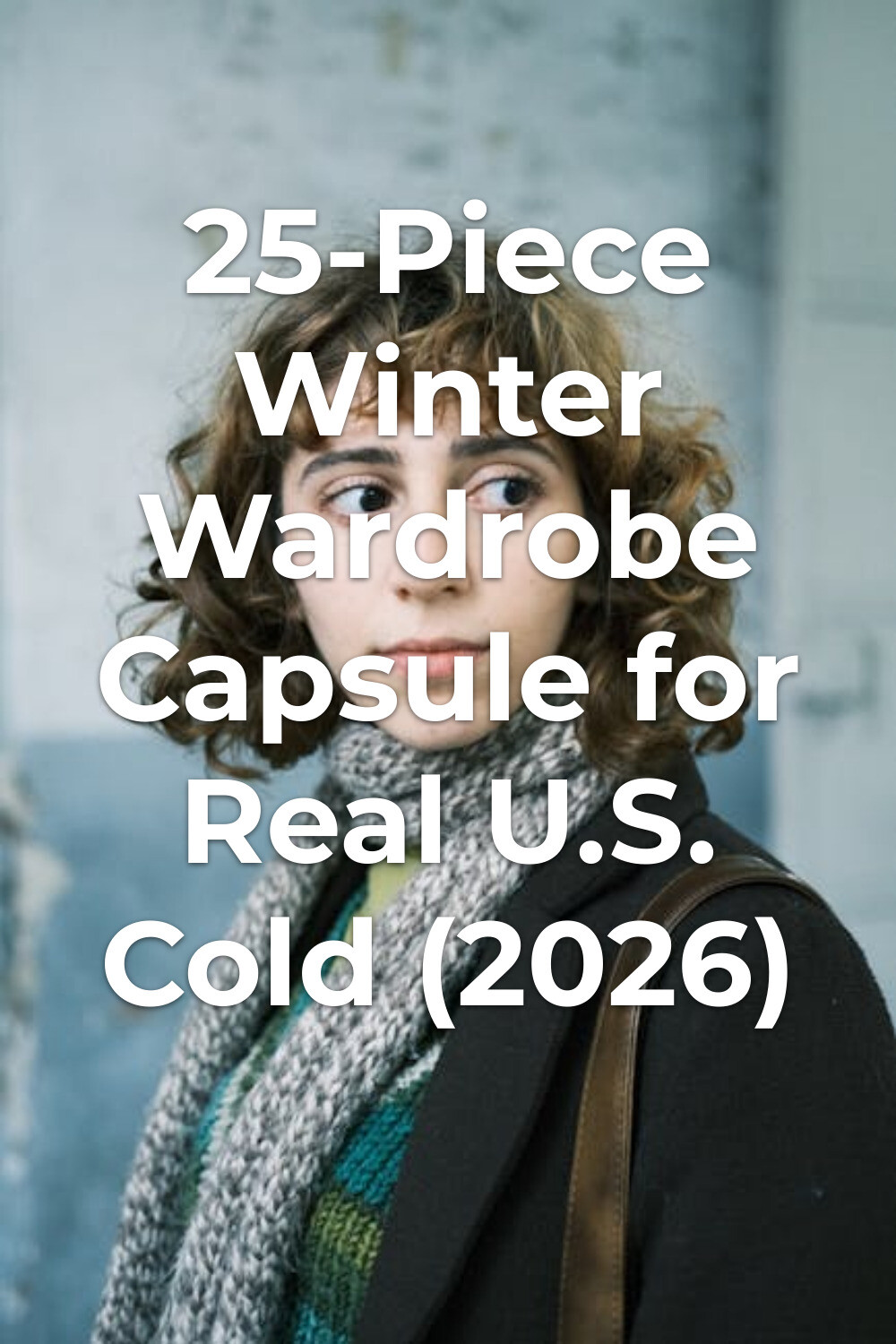 Winter Wardrobe Capsule Dark Coat and Scarf winter wardrobe capsule look with dark coat and knitted scarf on curly-haired person by worn wall