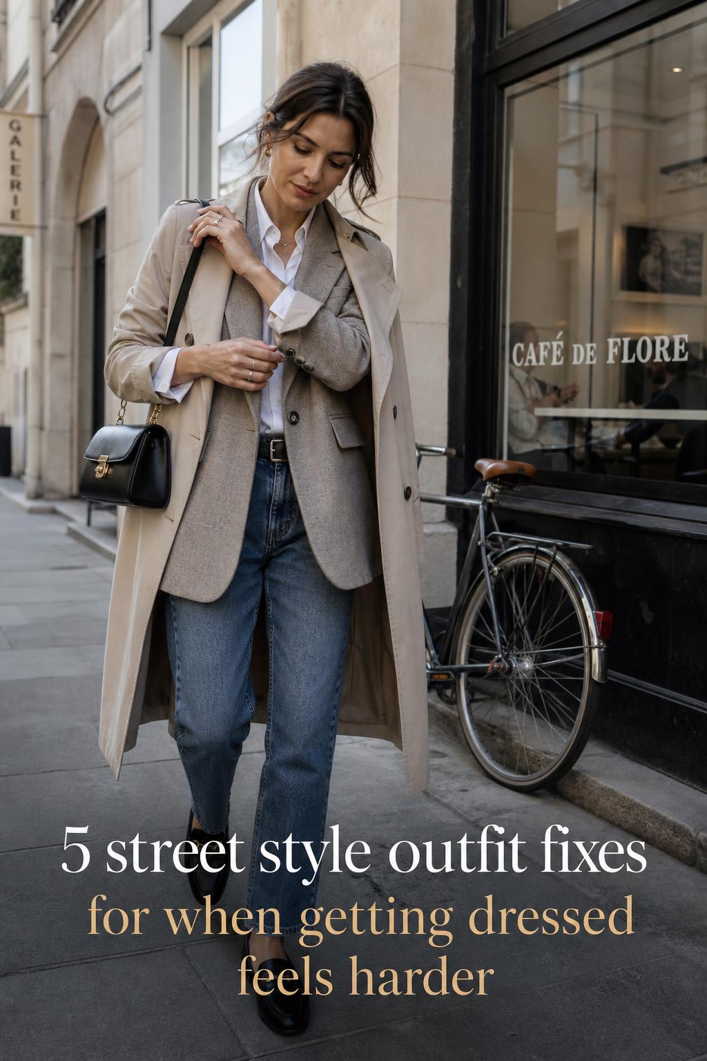 Street style outfit on an adult woman walking past a city café, adjusting a structured bag in soft morning light
